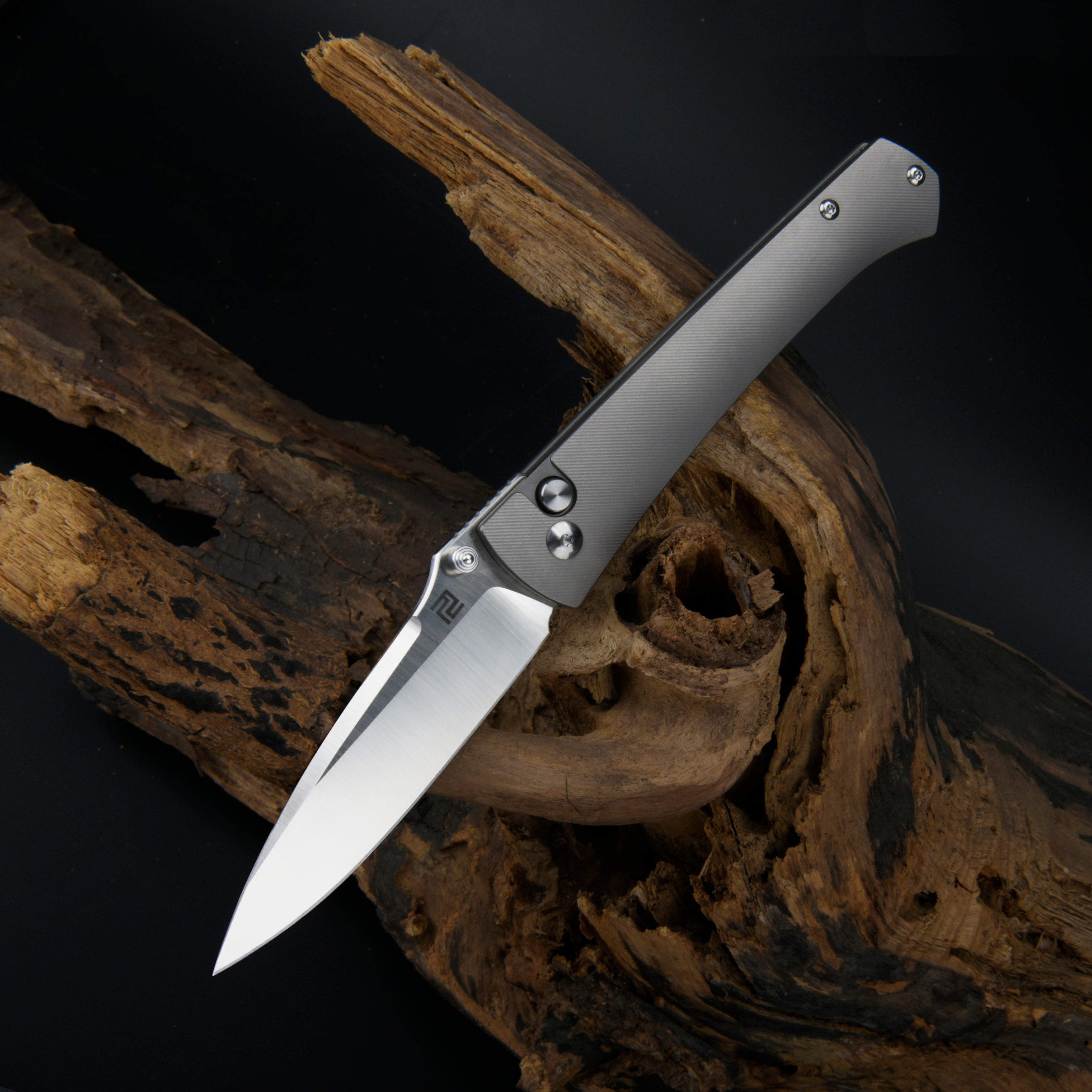 Artisan Cutlery Andromeda 1856G folding knife with titanium handle