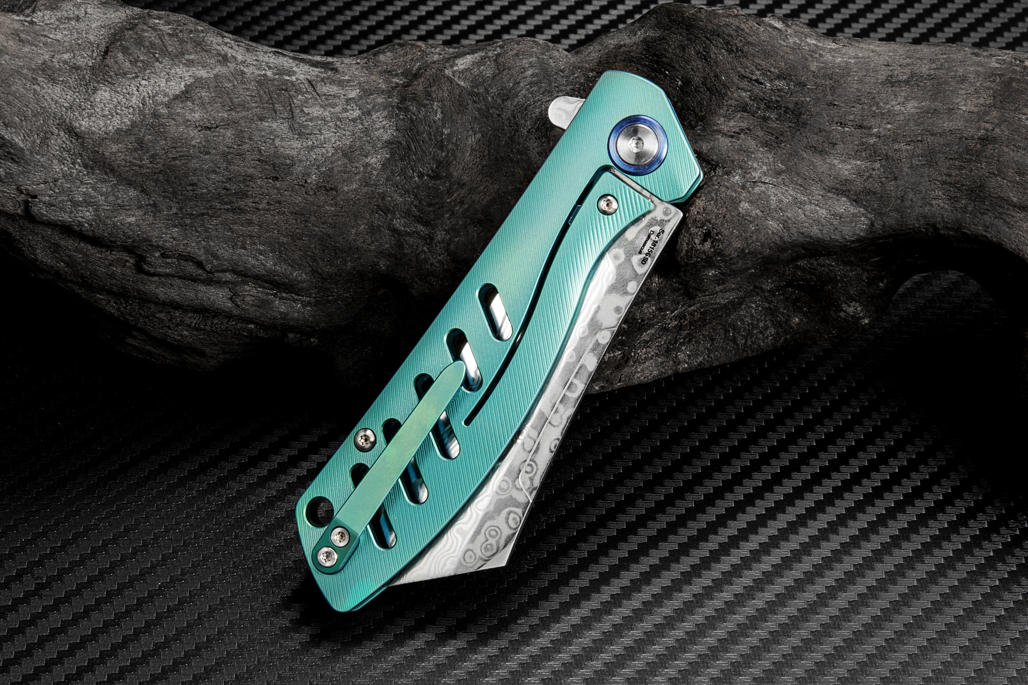 Artisan Cutlery Tomahawk folding knife with titanium handle