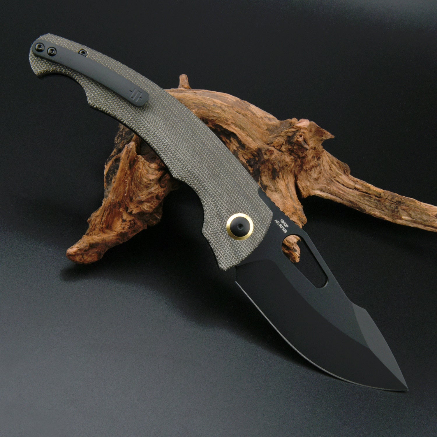 Artisan Cutlery Xcellerator 1860P folding knife with black Micarta handle